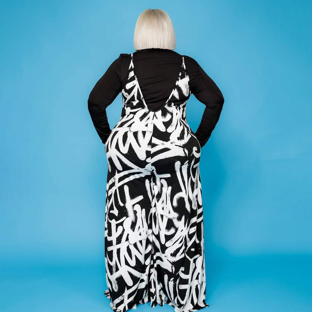 Blaze | Rugloze jumpsuit met wijde pijpen en graffitiprint