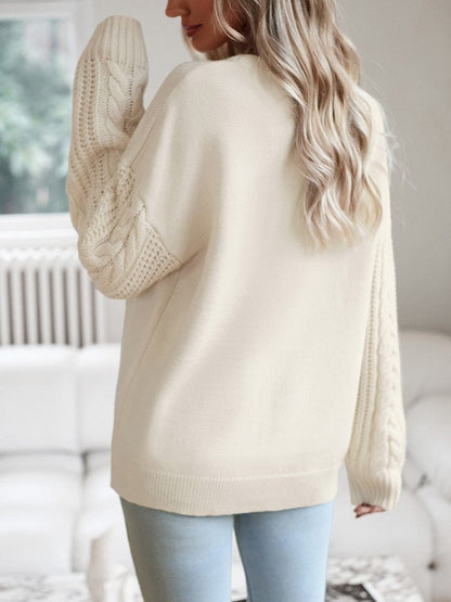 Rose - Beige trui met knitted mouwen