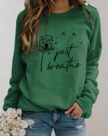 Sara - Oversized sweater met ronde hals en "Just Breath" statement