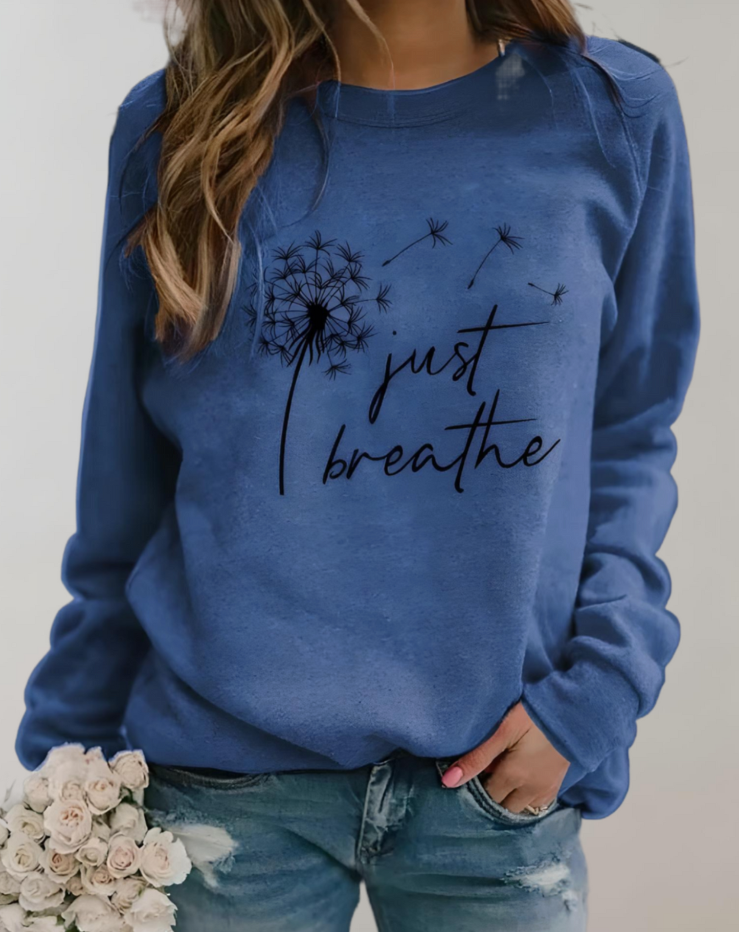 Sara - Oversized sweater met ronde hals en "Just Breath" statement