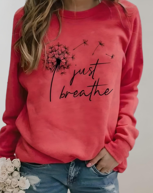 Sara - Oversized sweater met ronde hals en "Just Breath" statement